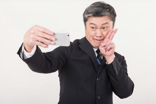 自撮りおじさん